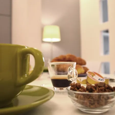 Couette-café Domus 129 *
